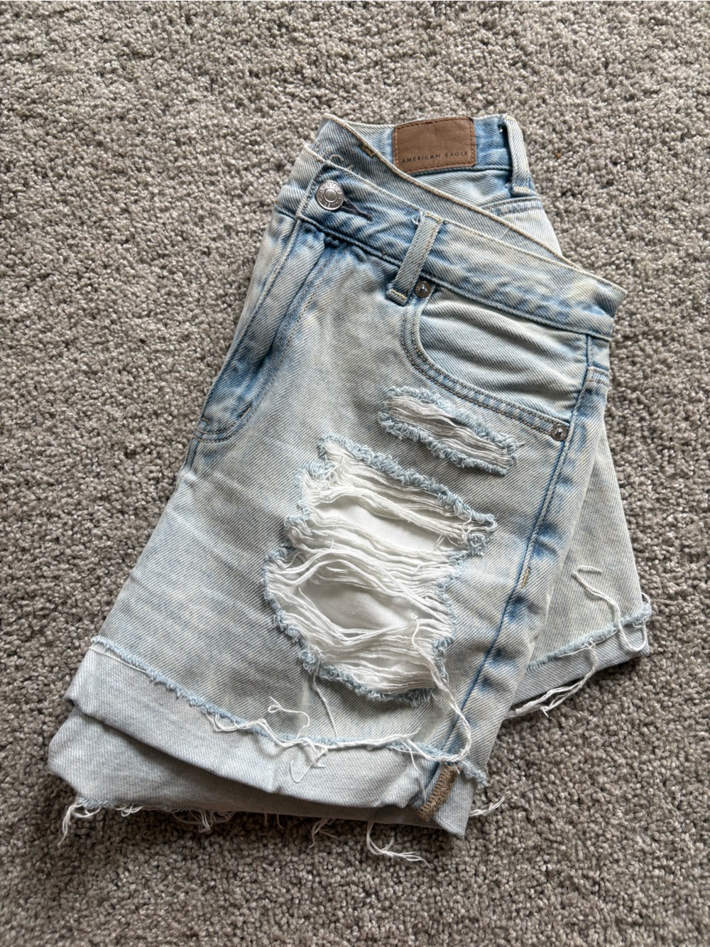 American Eagle Light Blue Denim Shorts with distressed pockets